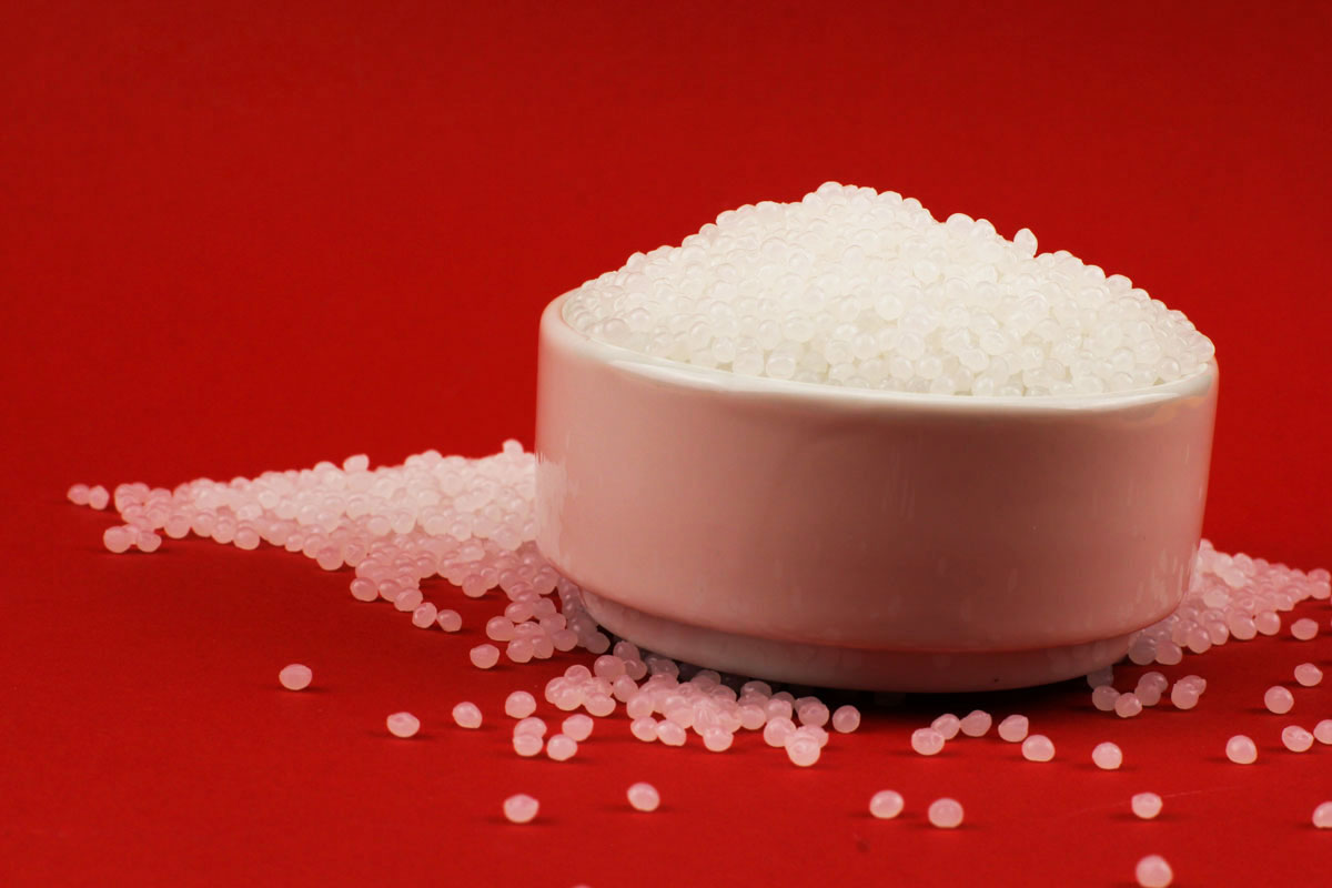 How can you reduce production costs using polymer masterbatch?