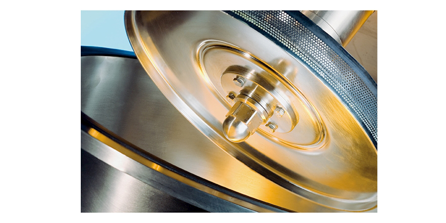 What is a vacuum bubble trap device?