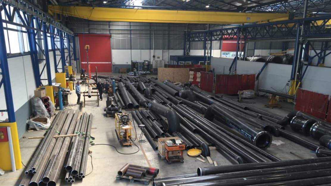 How can choosing the right pipes and fittings reduce costs?